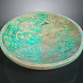 Green Bowl Shaped Sculpture With Intricate Carved Texture And Artistic Design