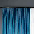 Blue Curtains With White Sheer Panel On Dark Wall And Wooden Floor