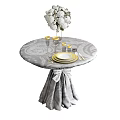 Round Coffee Table With Gray Tablecloth Draped Decoration White Flower Bouquet Golden Goblets And Cutlery