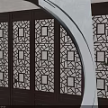 Chinese Traditional Circular Door Arch with Tile Roof Red Plaque Carved Design and Bamboo Plants