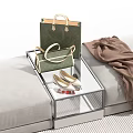 Elegant Green Handbag on Clear Glass Tray with Gold Shoes Brown Scarf and Gray Sofa