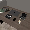 Silver Apple MacBook Laptop on Wooden Desk with Headphones Notebook Pencils Mouse Pad and Camera