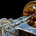 Advanced Satellite With Solar Panels Orbiting Earth In Outer Space