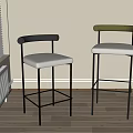 Modern Bar Stools With Curved Black And Green Backrests White Upholstered Seats And Metal Frames