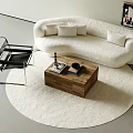 White Curved Sofa Set with Cushions Black Chair Wooden Coffee Table and Round Rug