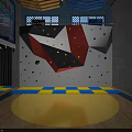 Indoor Climbing Wall With Colorful Grips And Safety Mats In Fitness Facility