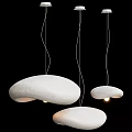 Textured White Cloud-shaped Modern Pendant Lights Hanging with Warm Glow in Contemporary Space