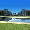 Aerial View Of School Building Complex With Green Lawns Water Features And Sports Field