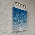 Transparent Acrylic Wall Decor With Blue Embossed Pattern And Metal Hook