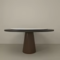 Round Dining Table With White Tabletop And Dark Wooden Base In Minimalist Room