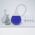 Translucent Ceramic Vessels With Blue Liquid In Various Shapes On Tray