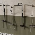 Wall Mounted Shower Heads In Different Styles On Green Tile Bathroom Wall
