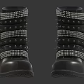 Stylish Black Leather Boots With Decorative Metal Studs And Strappy Design Details