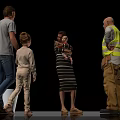 Group of people with man woman child baby and worker interacting in black background