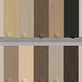 Various Wooden Wall Panels With Different Wood Tones And Decorative Balls On Display Shelf