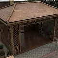 Traditional Wooden Roof Pavilion In Walled Garden With Lawn Steps And Trees