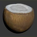 Halved Coconut With White Flesh And Brown Outer Shell On Dark Surface