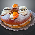 Delicious Cream Ring Cake With Powdered Sugar Whipped Cream And Orange Decorations On Silver Tray