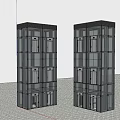 Modern Glass Facade Elevator Towers With Multiple Doors Against Evening Sky And Green Grass