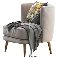 Gray Accent Chair With Gold Legs Colorful Pillow And Gray Throw Blanket Tassels