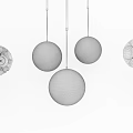 Various Spherical Pendant Lights With Decorative Patterns And White Gold Accents On Dark Background