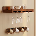 Wooden Wall Mounted Shelf With White Mugs Glass Pitcher And Hanging Wine Glasses