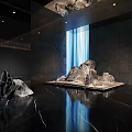 Contemporary Interior Space With Black Marble Floor Gray Walls Blue Curtains And Rock Sculptures