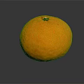 Single Fresh Ripe Orange with Bright Orange Hue on Black Surface Displaying Clear Reflection