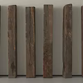 Natural Wooden Posts With Various Textures Arranged Against Wall 3d model
