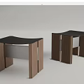 Two Modern Wooden Stools with Black Seats and Sleek Structure Design