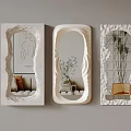 Unique Shaped Decorative Mirrors With Textured Frames Reflecting Interior Plants And Furniture