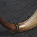 Handcrafted Wooden Horn Musical Instrument With Intricate Carved Patterns And Red White Beaded Strings