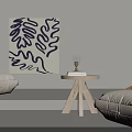 Comfortable Bean Bag Chair In Light Colored Interior With Wall Painting And Small Wooden Table