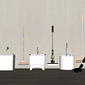 Cleaning Tools And Buckets Arranged Against Light Colored Wall On Wooden Floor