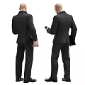 Two Men in Black Suits with Red Ties Checking Smartphones and Holding Black Folders