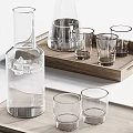 Modern Glass Tableware Set with Carafe Pitcher and Drinking Glasses on Wooden and White Trays
