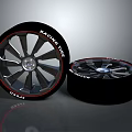 Car Sport Racing Tyres With Black Alloy Rims And Red Accent Stripes