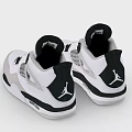 White and Black Jordan Sneakers with Gray Accents and Mesh Detailing
