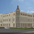European Style Building Exterior with Cream Exterior Red Roof Clock Tower Front Lawn and White Car