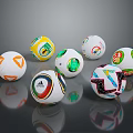Colorful Soccer Balls With Diverse Patterns And Brand Logos On Reflective Surface