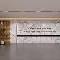 Modern Reception Desk In Spacious Lobby With Marble Wall And Decorative Plant