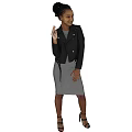 Woman In Black Leather Jacket Gray Skirt High Heels Waving Hand On Brown Background