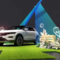 White SUV Car On Green Lawn With Crossed Blue Light Beams And Ornaments