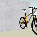 Stylish Yellow and Gray Mountain Bicycle Parked Next to Gray Wall