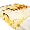 Amber Transparent Glass Side Table With Modern Geometric Design And Sleek Structure