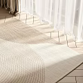 Light Beige Square Rug With Wavy Texture On Wooden Floor By White Curtains In Sunlight