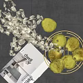 Fresh Green Pears in Gold Metal Basket with Golden Leaf Decoration and Dwell Magazine
