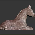 Red Terracotta Reclining Horse Sculpture With Textured Surface On Dark Background
