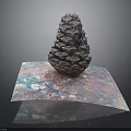Detailed Pinecone Resting On Colorful Patterned Paper Against Gray Background
