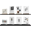 Billboards With Different Designs Including Black And White Photos Text Colorful Patterns Arranged On Shelves